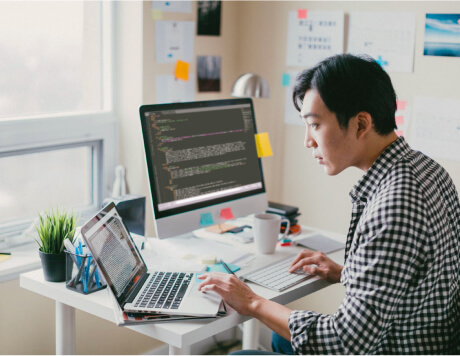 man works at a computer